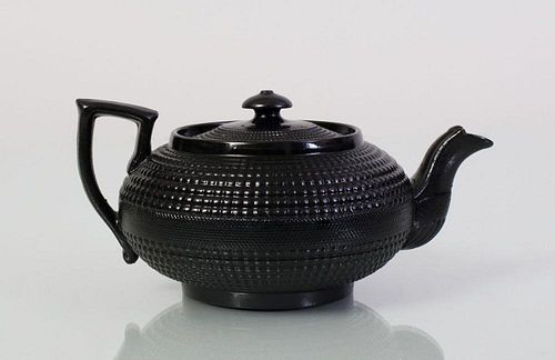 ENGLISH BLACK-GLAZED PORCELAIN CANE-WARE TEAPOT AND COVER
