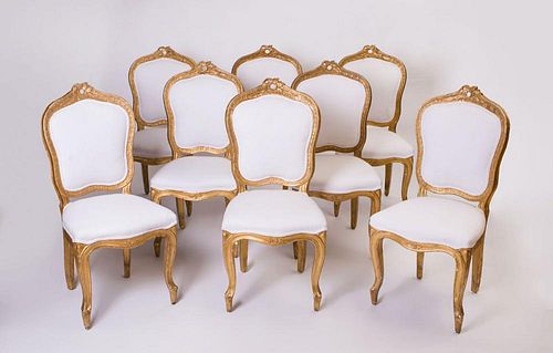 SET OF EIGHT LOUIS XV STYLE GILTWOOD SIDE CHAIRS