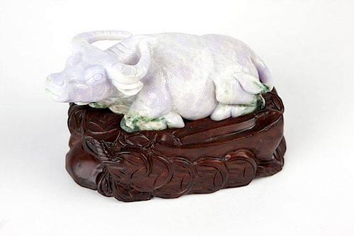 A carved lavender jadeite water buffalo
