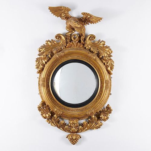 Regency dragon-crested giltwood convex mirror