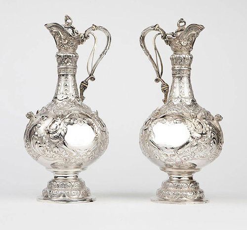 A pair of Victorian sterling silver ewers, Walter & John Barnard