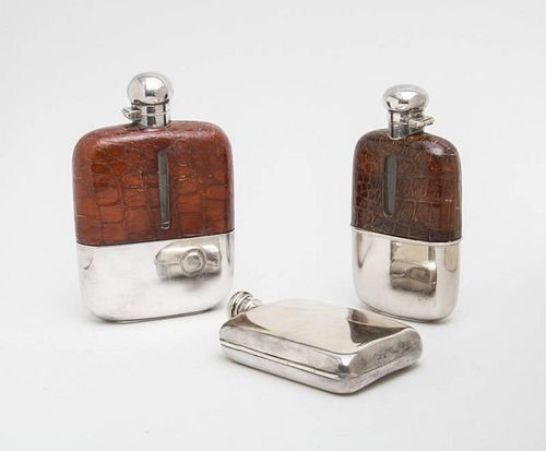 TWO ENGLISH ALLIGATOR-CLAD FLASKS WITH SILVER-PLATED SLEEVES AND A SILVER-PLATED HIP FLASK