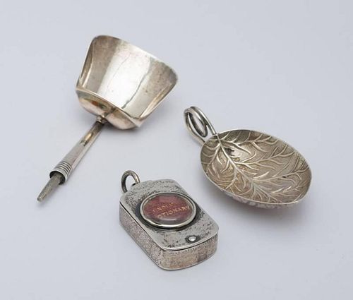 TWO GEORGE III SILVER CADDY SPOONS AND AN ENGLISH MINIATURE DICTIONARY CASE