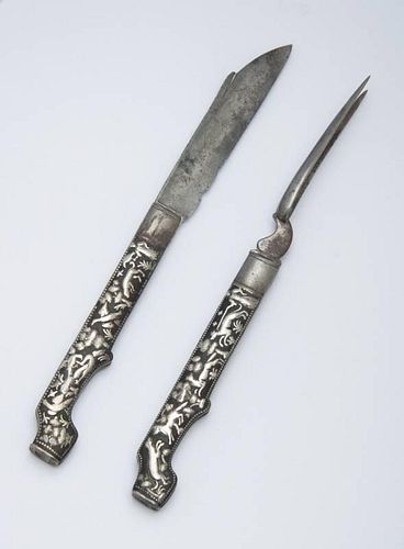 CONTINENTAL EMBOSSED STEEL FOLDING KNIFE AND FORK SET, POSSIBLY GERMAN