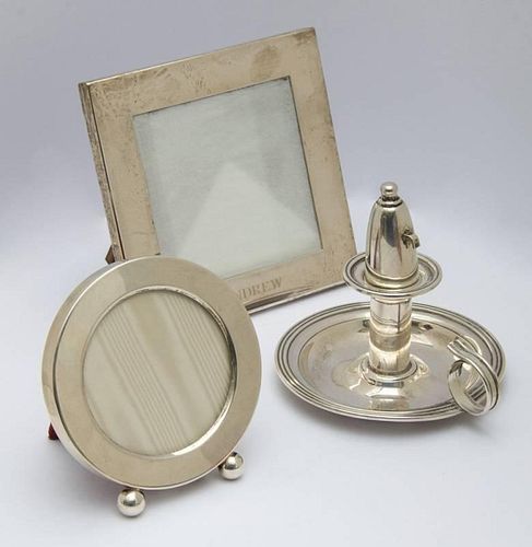 TWO SMALL SILVER PICTURE FRAMES AND A CIGARETTE LIGHTER WITH SNUFFER
