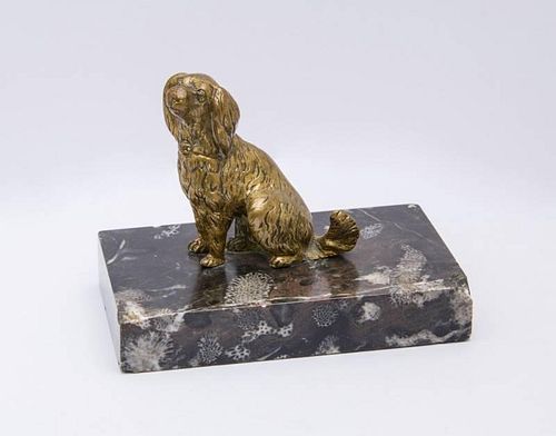 GILT-BRONZE MODEL OF A SEATED SPANIEL