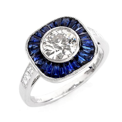 Art Deco style Approx. 1.14 Carat TW Diamond, .87 Carat Sapphire and Platinum Ring set in the Cente
