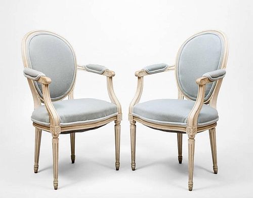 Pair of Louis XVI Style White-Painted Oval-Back Fauteuils en Cabriolet