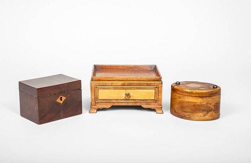 George III Inlaid Mahogany Tea Caddy, an Inlaid Mahogany Oval Puzzle Box, and a Miniature Wooden Stand with Drawer