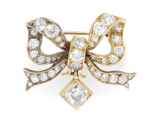An Antique Yellow Gold and Diamond Bow Brooch, 5.80 dwts.