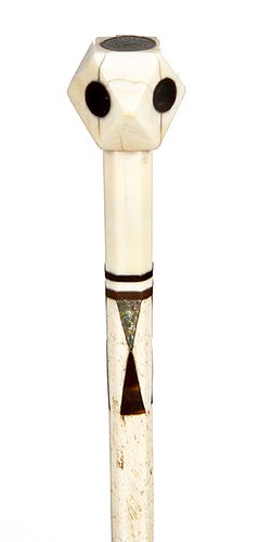 13. Scrimshaw Whale Bone cane - mid 19th C. – Whale’s tooth polygonal handle with 14 surfaces inlaid with exotic woods, silver half dime atop, a pair 