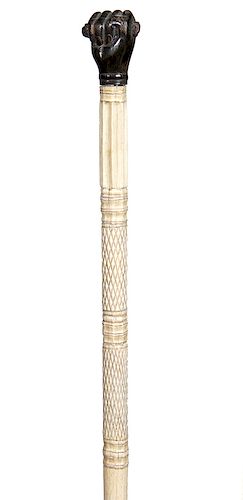 23. Baleen Fist Nautical Cane- Mid 19th Century- An unusual clenched fist nautical cane where the baleen has been pressed together to form the fist, t