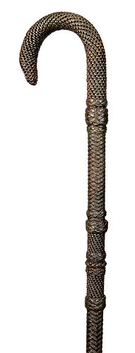 80. Nautical Macramé Cane- Ca. 1880- A fully tied and knotted seaman’s cane in fine condition with various collars and woven sections, entire cane has