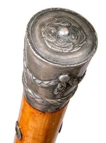 99. Silver Dress Cane- Ca. 1750- An ornate silver handle which has two hallmarks one is unreadable and the other is the number 13, it also has the ini
