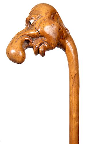 116. Anti-Semitic Folk-Art Cane- Ca. 1890- A large natural grown satirical depiction which was acquired by considerable haggling at Portobello Road in