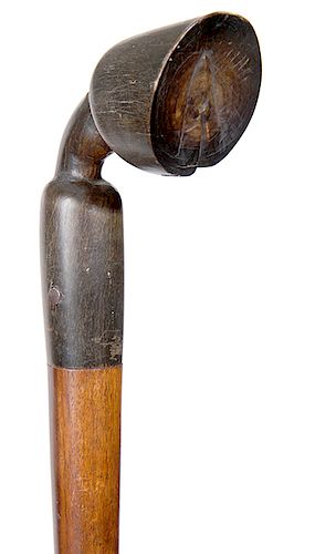 129. Horn Fetlock Cane- Ca. 1880- An early equestrian carved fetlock cane which has been carved from an American buffalo, detailed carving, exotic woo