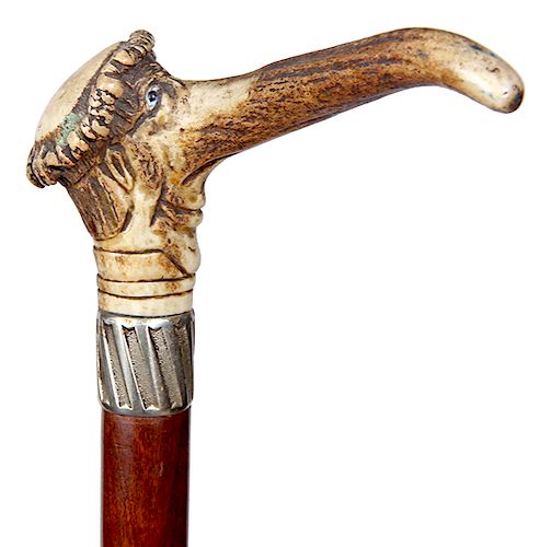152. Anti-Semitic Stag Cane- elk horn handle with two color glass eyes, slanted column silver metal collar, exotic wood shaft and a horn ferrule, H.- 