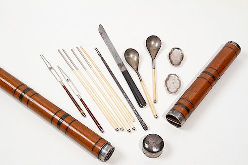 156. Oriental Picnic Cane- Ca. 1860- a two compartment picnic cane with a locking silver handle, when the handle is removed two spoons with bone handl