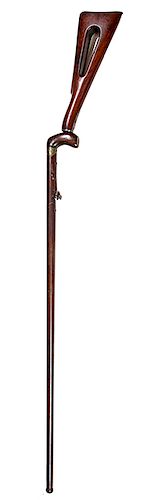 173.Day’s Patent Under hammer Cane- Ca. 1830- A percussion gun cane which has a separate shoulder stock, the shaft is metal and has a brass plate just