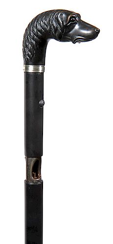 174. Remington Gun Cane- Mid 19th Century- A working .44 caliber Remington cane in fine working condition, silver metal collar, gutta percha handle an