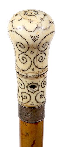 179. Ivory Pique Cane- Late 17th Century- A large prime example of one of the most sought after collector’s canes in fine condition, a pair of lanyard