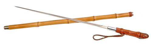 198. Sword Cane- Mid 20th Century- Bamboo root handle which is covered in leather, original leather lanyard, 21” acid etched blade in fine condition w