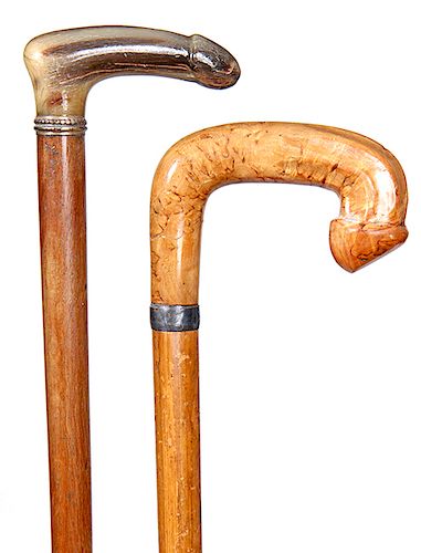209. Erotic Canes- Early 20th Century- A pair of carved penis canes of which one is horn and the other a burl wood, hardwood shafts and one has horn f