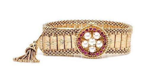 A 14 Karat Yellow Gold, Ruby and Cultured Pearl Belt Bracelet Watch, 38.60 dwts.