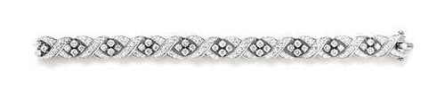 A Platinum and Diamond Bracelet, 26.40 dwts.