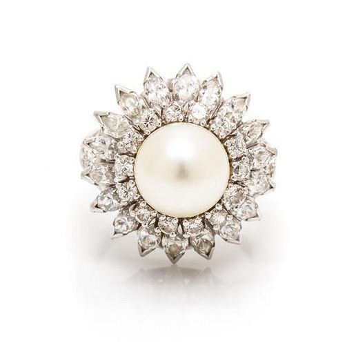 A Platinum, Diamond and Cultured Pearl Ring, 9.80 dwts.