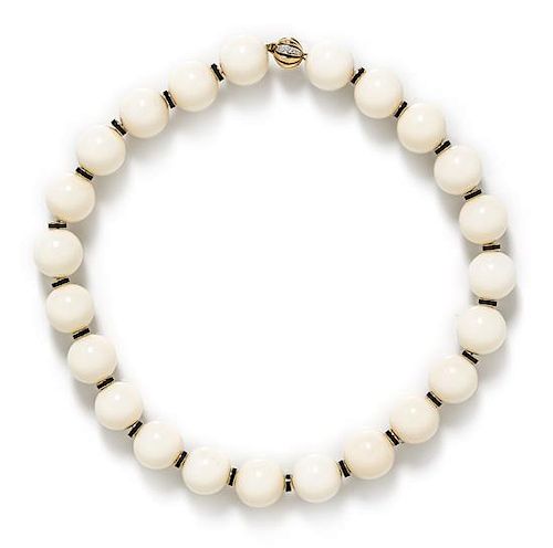 An 18 Karat Yellow Gold and White Hardstone Bead Necklace,