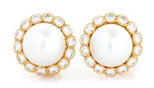 A Pair of 18 Karat Yellow Gold, Cultured South Sea Pearl and Diamond Earclips, Van Cleef & Arpels, 17.10 dwts.