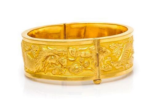A 24 Karat Yellow Gold Chinese Gold Wedding Bangle, 35.80 dwts