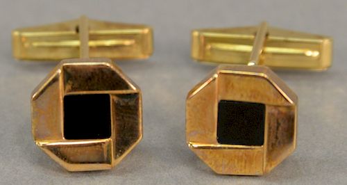 Pair of 18 karat gold cufflinks, "Chase", with black centers. 13.8 grams.   Provenance: Estate of Peggy & David Rockefeller havi...