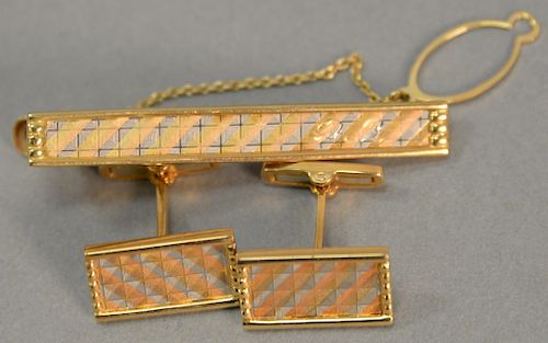 Three piece Mitsubishi 18 karat lot to include cufflinks and tie clip with multicolor surfaces, monogrammed: DR