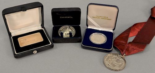 Four silver presentation medallions, two marked: To David Rockefeller. 6.4 troy ounces. diameter 1 1/2 inches to 2 inches.   Pro...