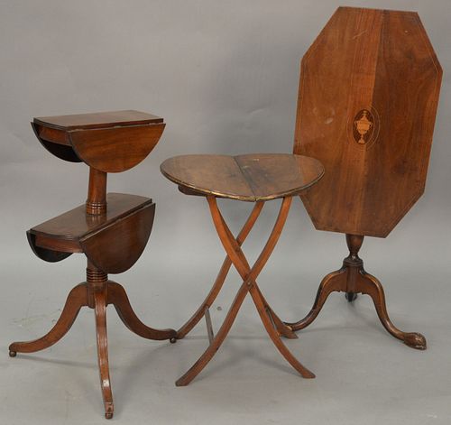 Three piece group to include a Georgian Mahogany two tier stand with drop leaves with Rockefeller inventory label inscribed DR52.140...