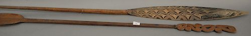 Two African paddles, one with painted end and the other with carved handle. lengths 81 inches and 73 inches.   Provenance: Estat...