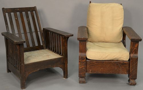 Two oak Morris chairs (as is).   Provenance: Estate of Peggy & David Rockefeller having stamp/label.