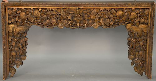Two carved giltwood valances with carved scrolling vine and flowers. heights 26 inches each, lengths 49 inches and 97 inches.   ...