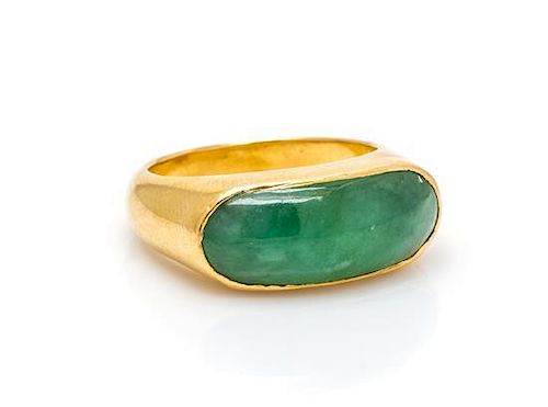 A 22 Karat Yellow Gold and Jade Saddle Ring, 5.50 dwts.