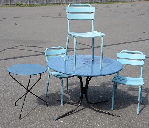 Five piece outdoor set to include a round metal table, three side chairs, and a metal side table. height 28 inches, diameter 42 inch...