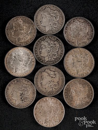 Ten Morgan silver dollars.