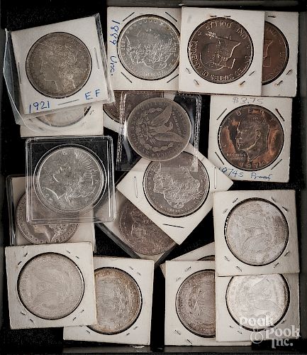 Fourteen Morgan silver dollars