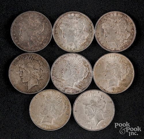 Five Peace silver dollars