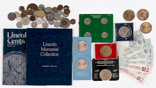 Miscellaneous group of coins and currency.