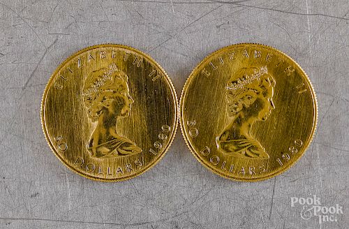 Two Canadian fifty dollar 1 ozt fine gold coins.