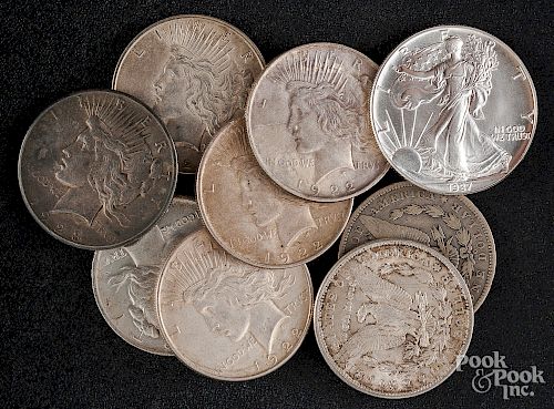 Six Peace silver dollars