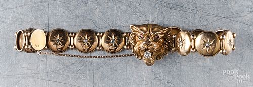 10K gold and diamond lion mask bracelet, 9.3 dwt.