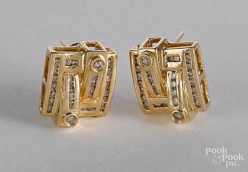 Pair of 14K yellow gold and diamond earrings, 6.6